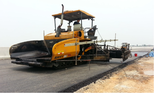 Staff are operating a paver