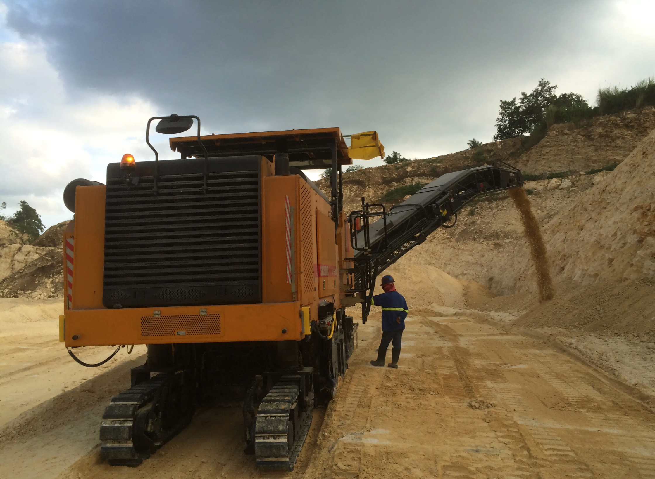  Asphalt milling machine removing old driveway surface