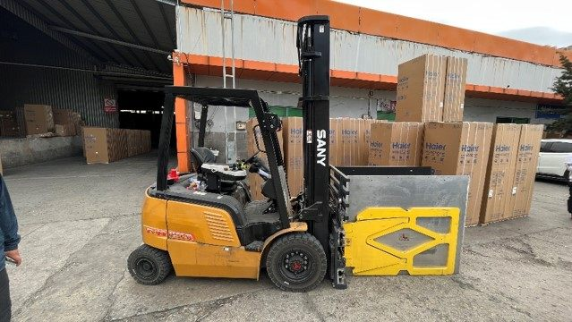 Forklift handling goods
