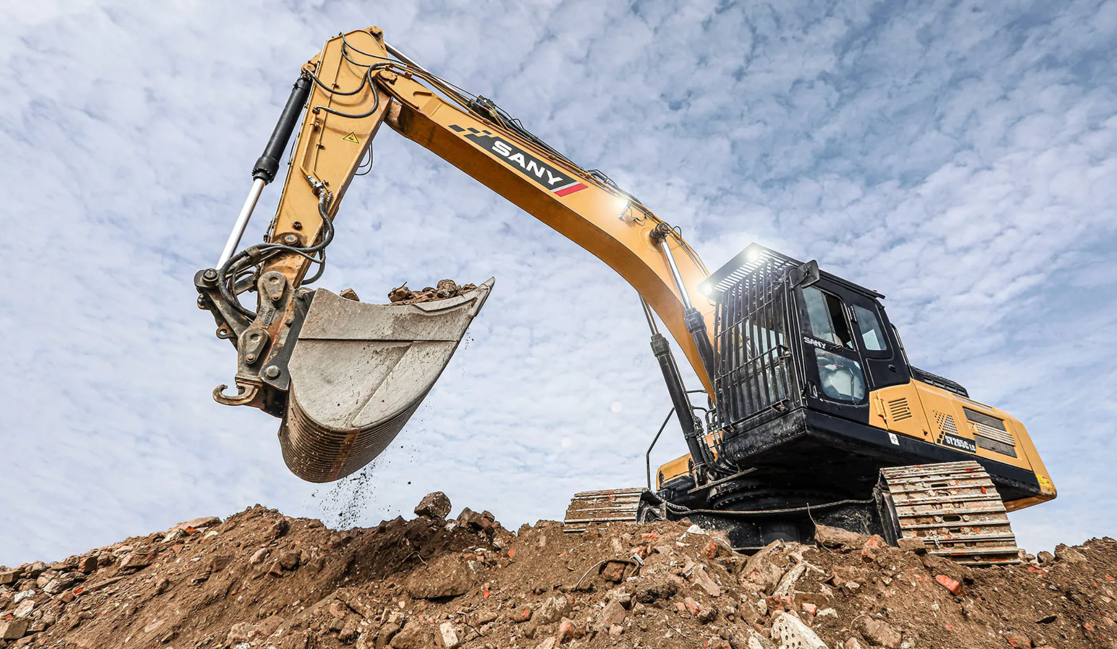 SANY medium excavator in a land clearing operation